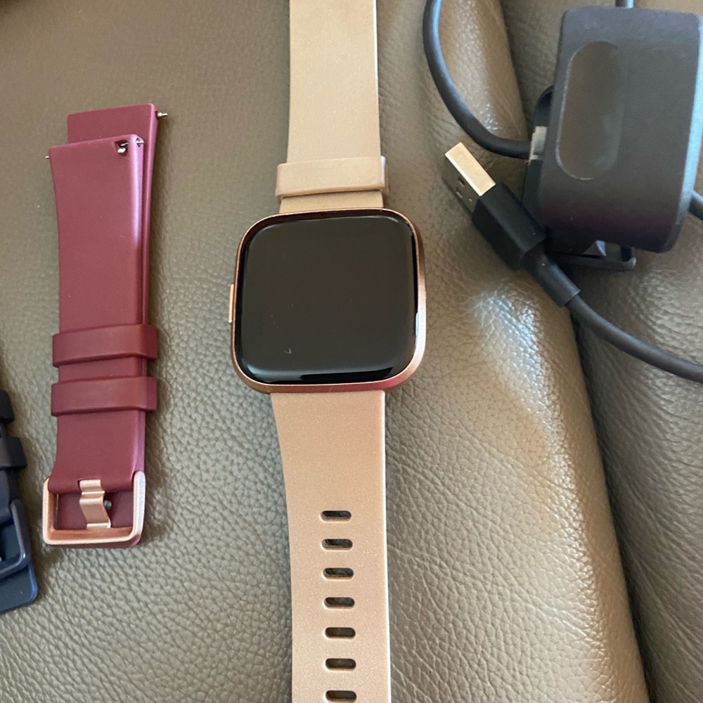 Fitbit versa 2. Rose gold with 5 bands and charger.  SOLD